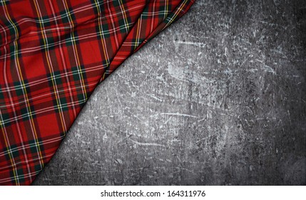 Tartan Textile On Stone Background