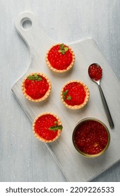 Tartlets With Red Caviar, On A Light Background, Close-up, Top View, No People,