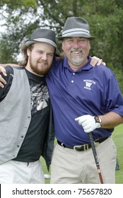 TARZANA, CA - APRIL 18: Cooper Karn and his dad Richard Karn participate in the 8th annual "Hack n' Smack, Kerry Daveline Memorial, Celebrity Golf Classic" on April 18, 2011 in Tarzana, CA