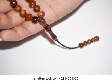 Tasbih Beads Detail On A White Background