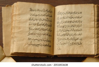 Tashkent, Uzbekistan - August 10, 2009: Ancient Open Book In Arabic. Old Arabic Manuscripts And Texts