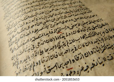 Tashkent, Uzbekistan - August 10, 2009: Ancient Open Book In Arabic. Old Arabic Manuscripts And Texts