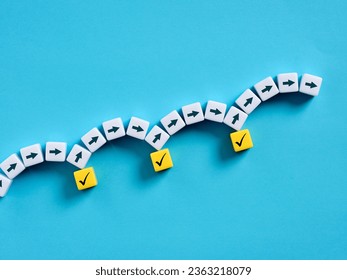 Task fulfillment or accomplishment. Project tracking and managing project timeline. Verification in business. Arrow and map pin symbols on cubes.