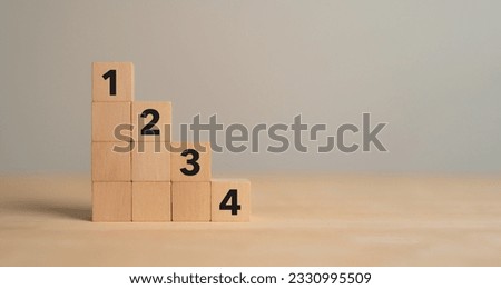 Task priority and management concept. The order of priority in any activity. Set work priority, arrange to do list. Wooden cube blocks with number first, second, third and fourth.