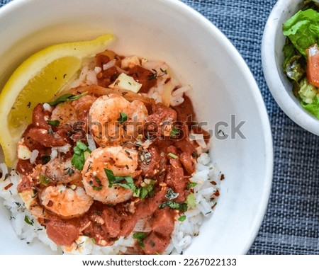 Taste of the south with this spicy and flavorful shrimp creole dish rice lemon bold zesty flavors Creole seasonings, tangy tomato-based Cajun sauce, easy NOLA recipe New Orleans