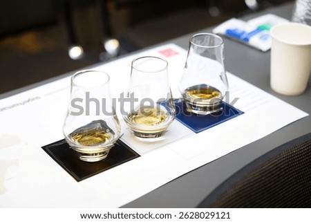 Tasting experience with multiple whisky samples at a cozy venue