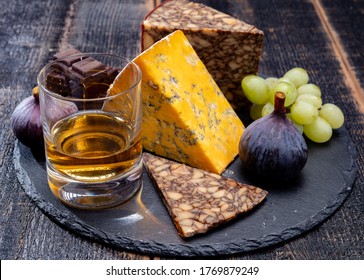 Tasting Of Irish Blended Whiskey And Cheeses From Ireland And UK, Dark Background