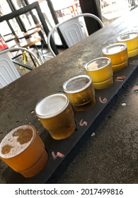 Tasting Paddle Of Beer On A Warm Day