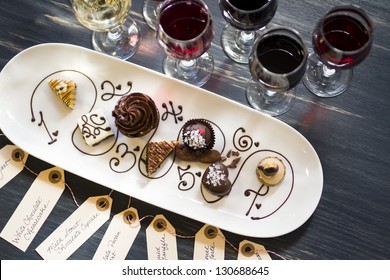 Tasting Of Wine And Pattie Chocolate Pastries.