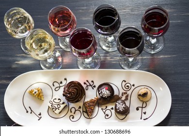 Tasting Of Wine And Pattie Chocolate Pastries.