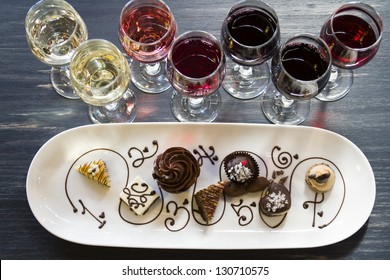 Tasting Of Wine And Pattie Chocolate Pastries.