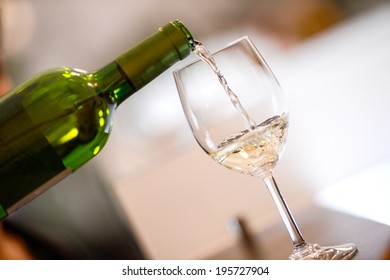 Tasting-White Wine Pour In A Glass