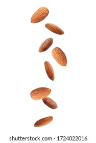 Tasty almonds falling on white background 