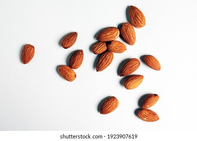 Tasty Almonds On White Background