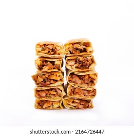 Tasty Arabian Chicken Shawarma Stacked On White Background, With Fries  Sauce. Delicious Arab Food Shawarma Wrap