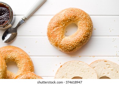 Tasty Bagel With Sesame Seed On White Table