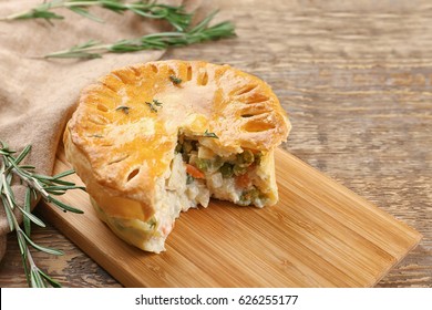 Tasty Baked Chicken Pot Pie On Wooden Board