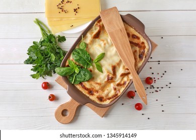 Tasty Baked Lasagna On White Table