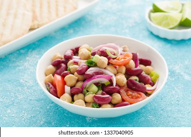 Tasty Bean Salad With Chick Peas, Kidney Beans And Tomatoes.