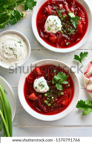 Similar – Image, Stock Photo Tasty beetroot soup borscht. Top view, flat lay