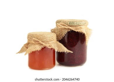 Tasty berry jam in jar isolated on white background. Top view