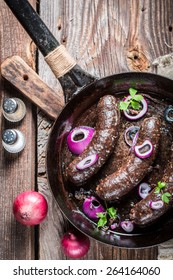 Tasty black pudding with parsley and onion