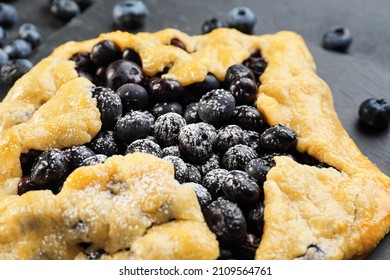 Tasty Blueberry Galette On Table, Closeup