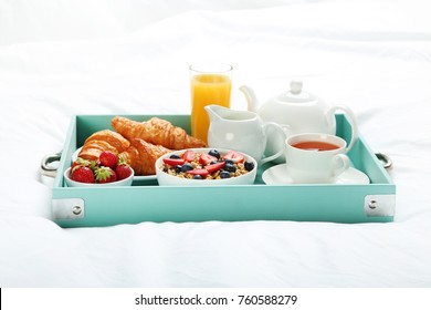 Tasty Breakfast In Bed On Wooden Tray