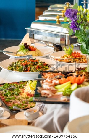 Tasty buffet with different dishes family together during party
