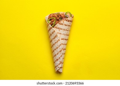 Tasty Burrito On Yellow Background