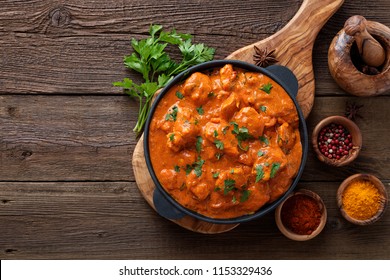 Tasty butter chicken curry dish from Indian cuisine. - Shutterstock ID 1153329436