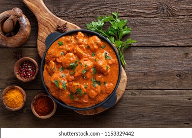 Tasty butter chicken curry dish from Indian cuisine. - Shutterstock ID 1153329442