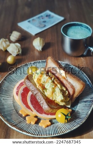 Similar – Foto Bild Fischbrötchen und Bratwurst/Pommes-Werbung auf einem Imbissdach