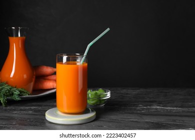 Tasty Carrot Juice On Black Marble Table, Space For Text