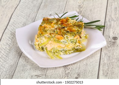 Tasty casserole with salmon and broccoli served rosemary - Powered by Shutterstock