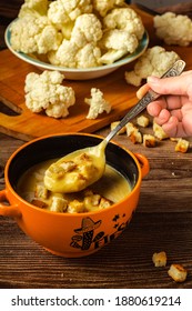 Tasty Cauliflower And Cheese Soup Puree Topped With Croutons. Homemade Vegetable Cream Soup On A Wooden Table. Vertical Orientation