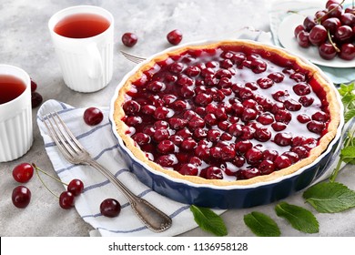 Tasty cherry pie on table