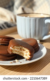 Tasty Choco Pies And Cup Of Hot Drink On Wooden Tray