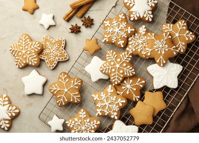 Tasty Christmas cookies with icing and spices on light table, flat lay - Powered by Shutterstock