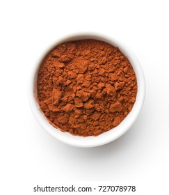 Tasty cocoa powder in bowl isolated on white background.
