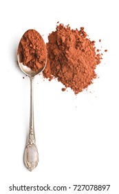 Tasty cocoa powder in spoon isolated on white background.