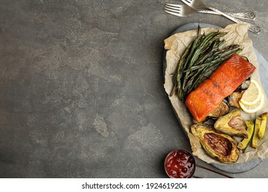 Tasty Cooked Salmon And Vegetables Served On Grey Table, Flat Lay With Space For Text. Healthy Meals From Air Fryer