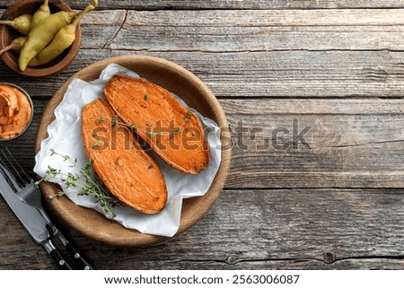 Similar – Image, Stock Photo Baked sweet potato with vegetable filling.