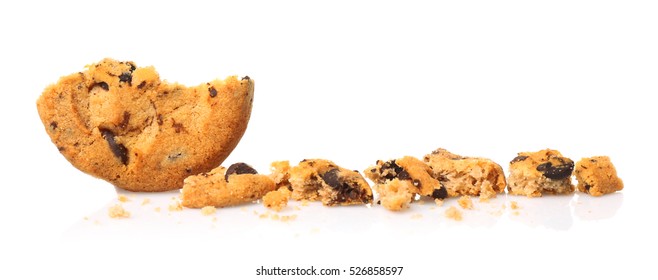 Tasty Cookie With Chocolate Chips And Crumbs On White Background