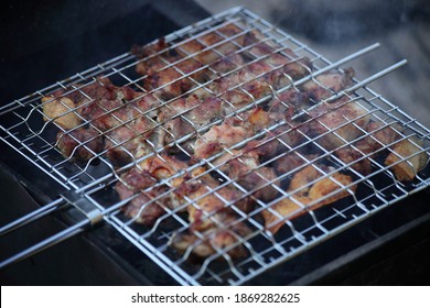 Tasty Crisp Mix Meat Barbecue On A Metal Grid In The Grill Closeup - Outdoor Kitchen, Party, Recreation, Healthy Food