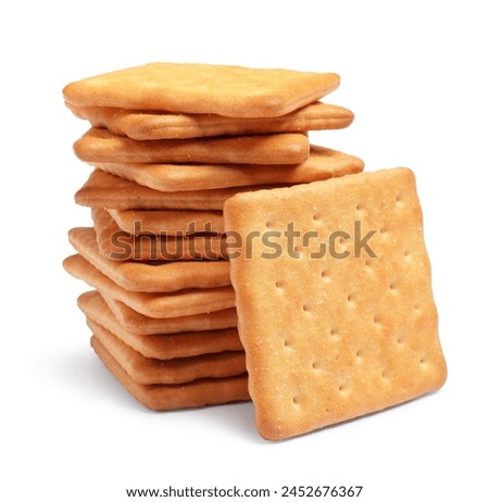 Tasty crispy square crackers isolated on white