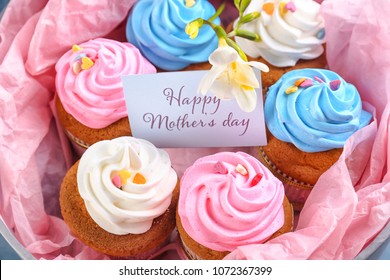 Tasty cupcakes in box, closeup. Mother's Day celebration - Powered by Shutterstock