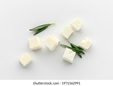 Tasty Cut Feta Cheese On White Background