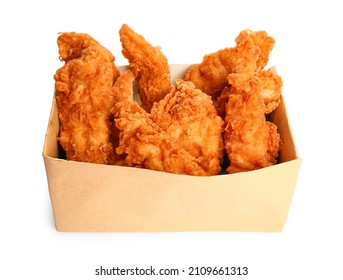 Tasty deep fried chicken wings in paper box on white background