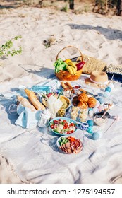 Tasty Food And Accessories Outdoor Summer Or Spring Picnic. Lunch In The Beach.